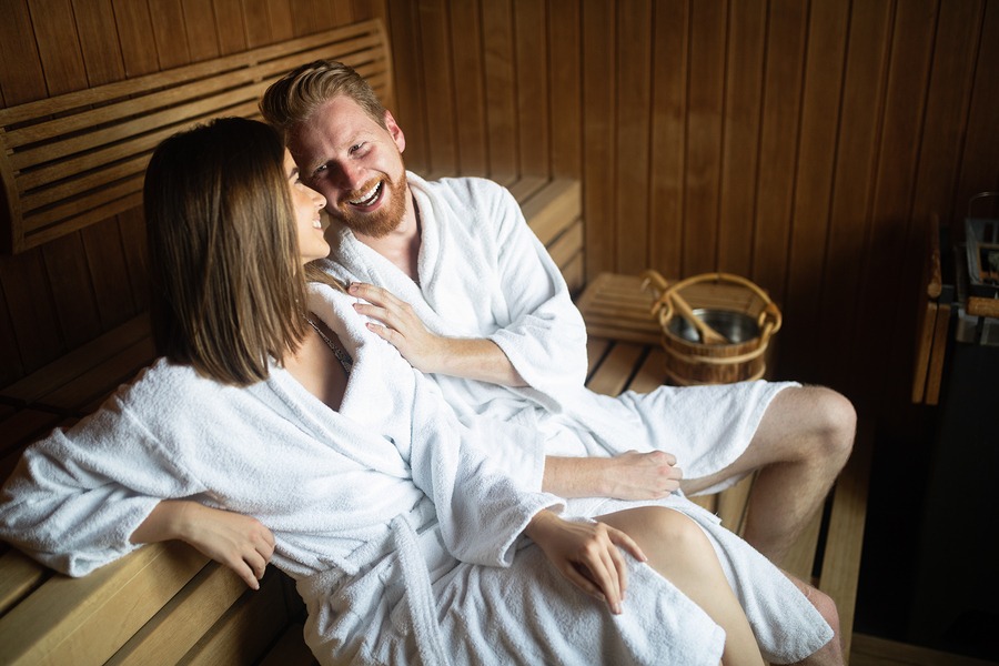 Young happy couple relaxing at spa resort in New York City Juvenex sap. Relax, vacation