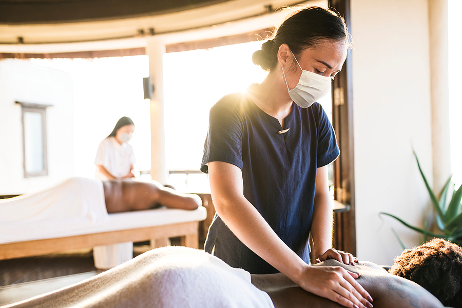 Open full resolution image of woman receiving face massage