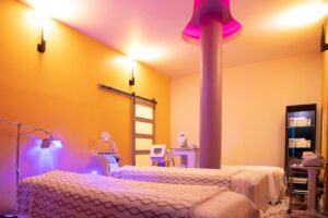 Empty room with tables inside Juvenex Spa